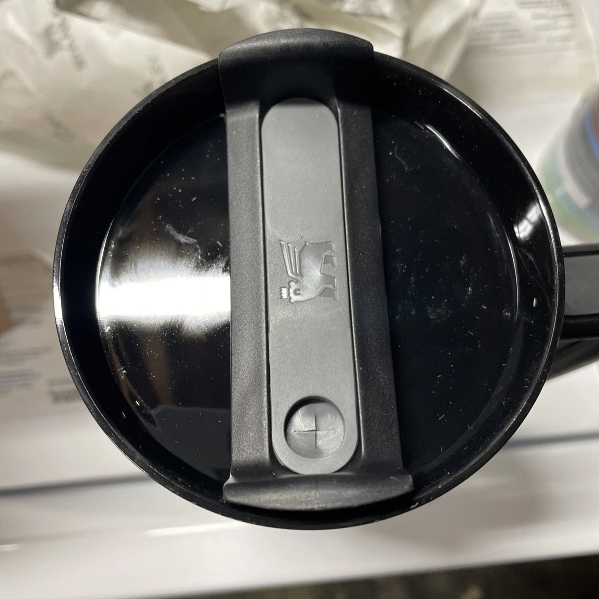 Product Title: Black Travel Tumbler with Handle, Lid & Stainless Steel Accent