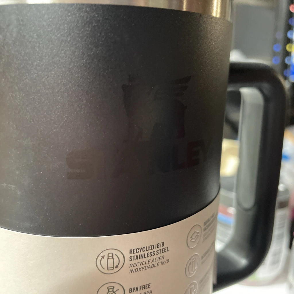 Product Title: Black Travel Tumbler with Handle, Lid & Stainless Steel Accent